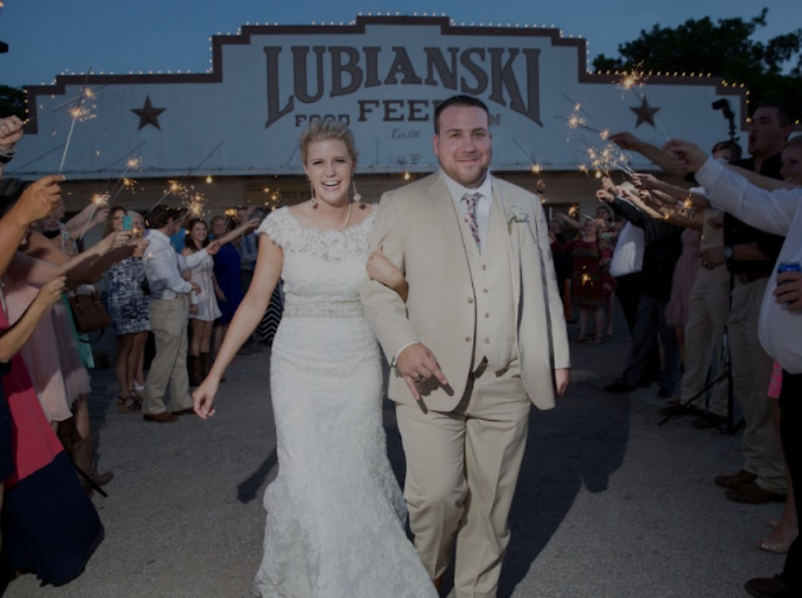 A wedding sparkler send-off outside Lubianski Hall